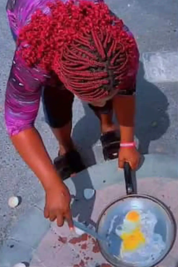 Moment Dubai-based lady reportedly uses sun to fry eggs (Video)