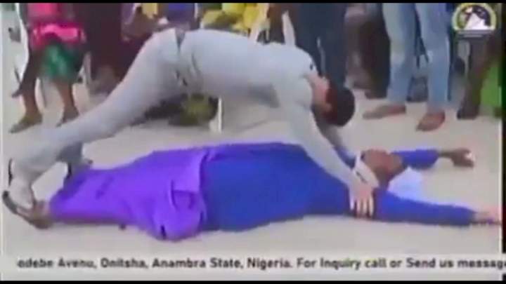 Watch Pastor Odumeje perform deliverance in a 'weird position' on a reverend sister (Video)