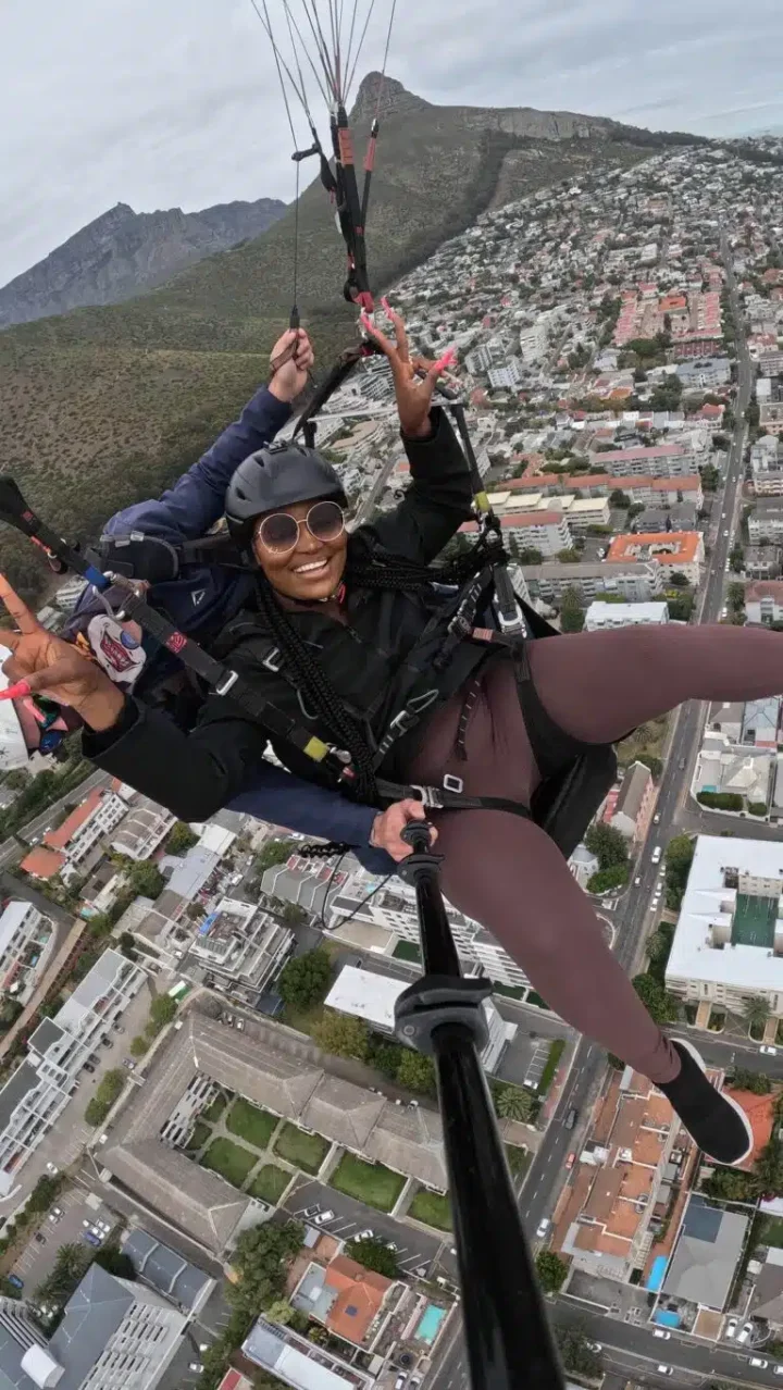 'My husband can never but I get coconut head' - Chizzy Alichi brags as she goes skydiving in Capetown (Photos)