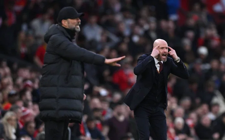 Jurgen Klopp, Manager of Liverpool, gestures as Erik ten Hag, Manager of Manchester United, reacts during the Emirates FA Cup Quarter Final between...