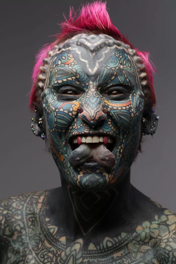 World's most tattooed woman unrecognisable after covering 99.98% of body in ink