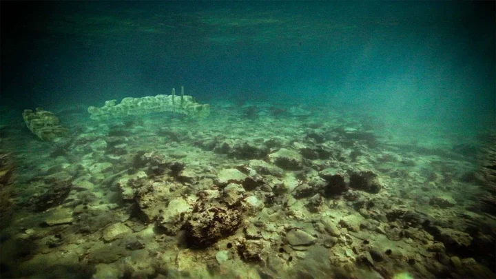 A view of stone foundation ruins underwater