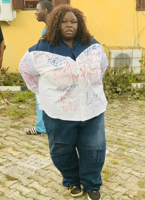 Photos of plus-sized female graduate goes viral as she signs out in grand style