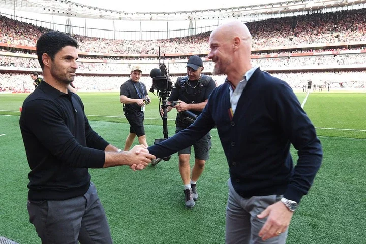 Mikel Arteta, Manager of Arsenal, shakes hands with Erik ten Hag, Manager of Manchester United, prior to the Premier League match between Arsenal F...