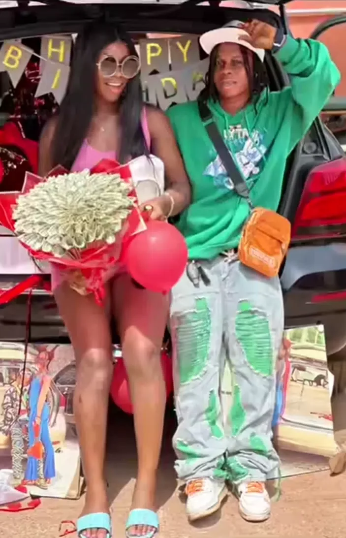 Nigerian man surprises girlfriend with iPhone 14, wigs, money bouquet on birthday (Video)