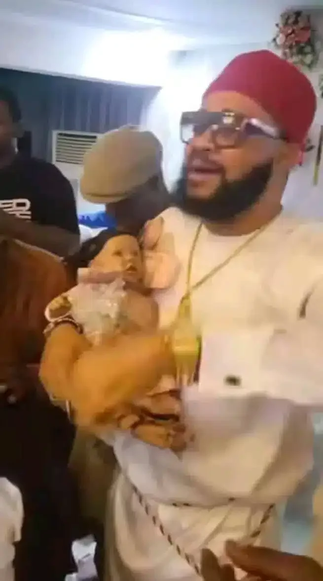 Couple reportedly uses doll baby to stand in for their daughter during celebration