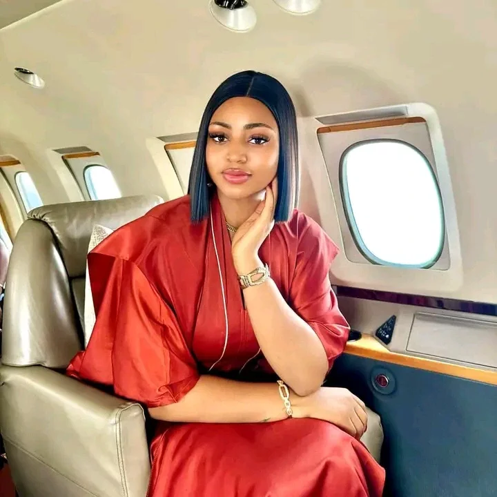 Regina Daniels shows off her security personnel as she goes for a trip in her private jet