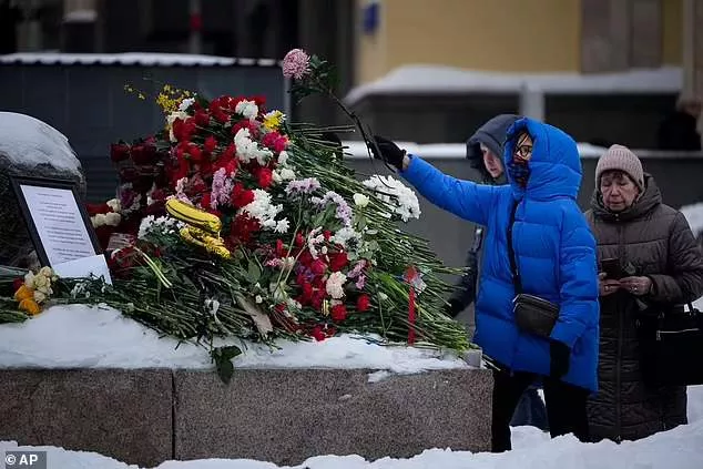 Russia begins jailing hundreds of protesters for laying flowers and candles in memory of 