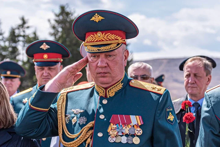 Andrey Gurulev, a Russian MP, saluting.