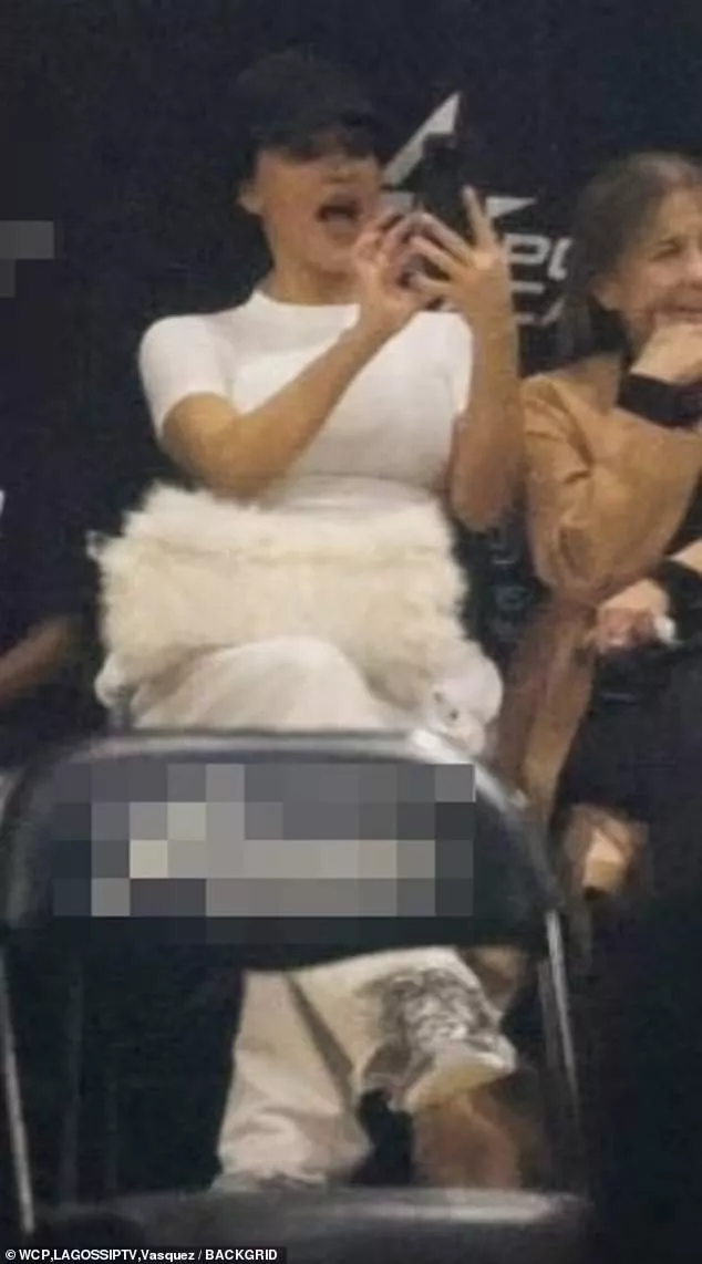 Kim dropped her jaw during a proud moment as she recorded Saint's game
