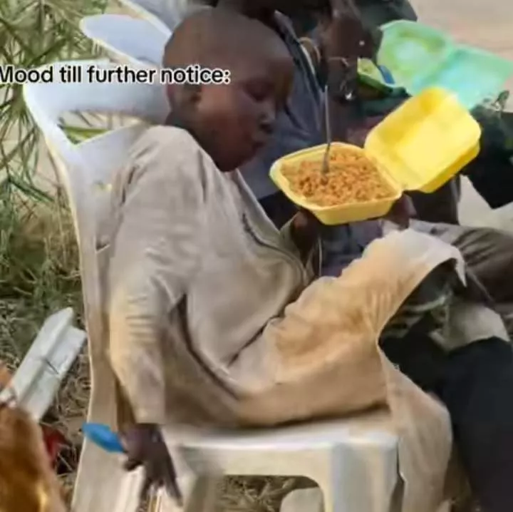 'Future FCT minister' - Little boy dances excitedly, wows many as he gets a free plate of rice at a Nigerian party