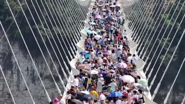 See How The Chinese Glass Bridge Was Tested Before People Were Allowed To Cross (Photos)