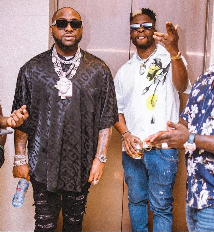 "Dem suppose break bottle for this guy head" - Davido's DJ, Ecool dragged to shreds for almost ruining singer's O2 show (Video)