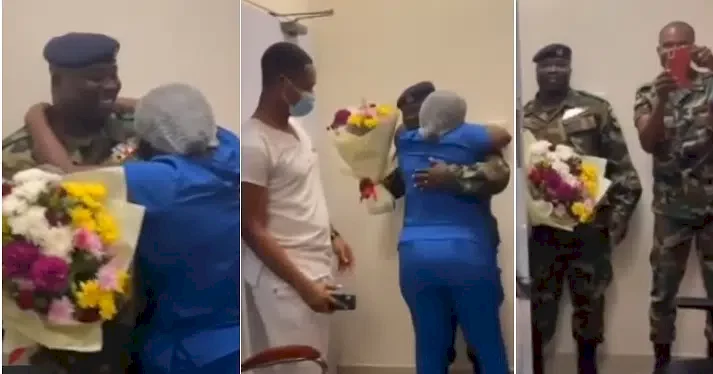 Nurse screams in joy as her soldier lover shows up unannounced at her workplace, gifts her flowers (Video)