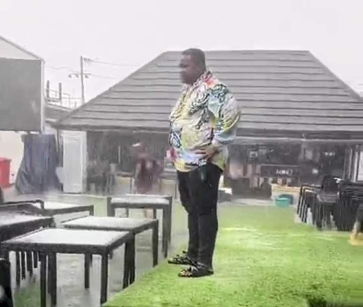 "I paid 7 rain makers so that I can clean" - Cubana Chief Priest wows netizens as heavy downpour hits his business environs (Video)