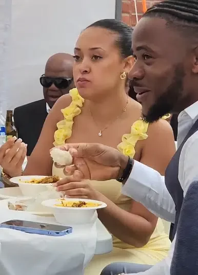 'He taught her well' - Nigerians gush with satisfaction as British lady rolls and eats fufu like a pro