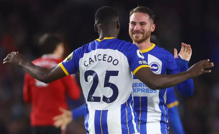 Brighton players celebrate together