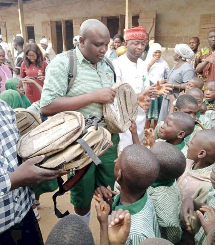 Moment Man Appears In School Uniform, Donates Bags, Drums To Schoolchildren [Photos]
