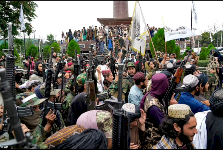 Jubilant Taliban fighters celebrate outside abandoned US embassy and declare a national holiday on one year anniversary of US military leaving Afghanistan (videos)