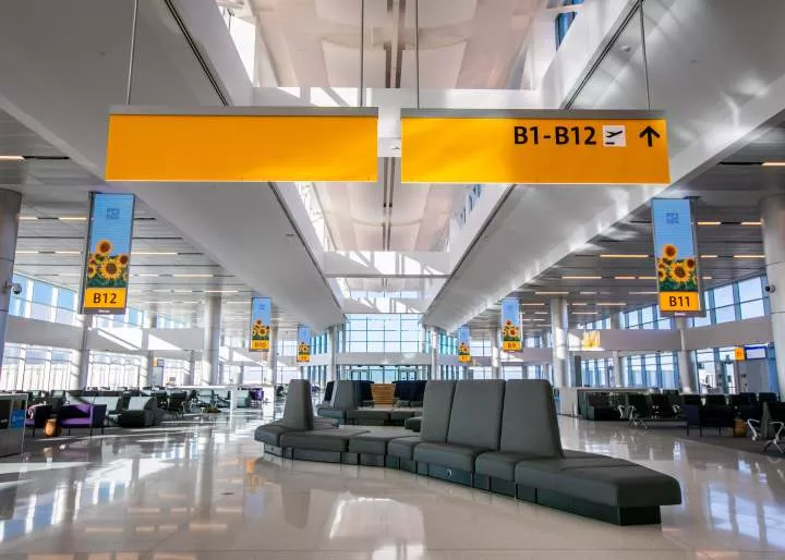 Airport designers explain why terminals are so uncomfortable.