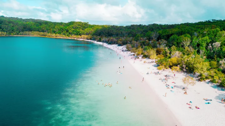 K'Gari Island is the home to Lake McKenzie, a freshwater lake with clear waters