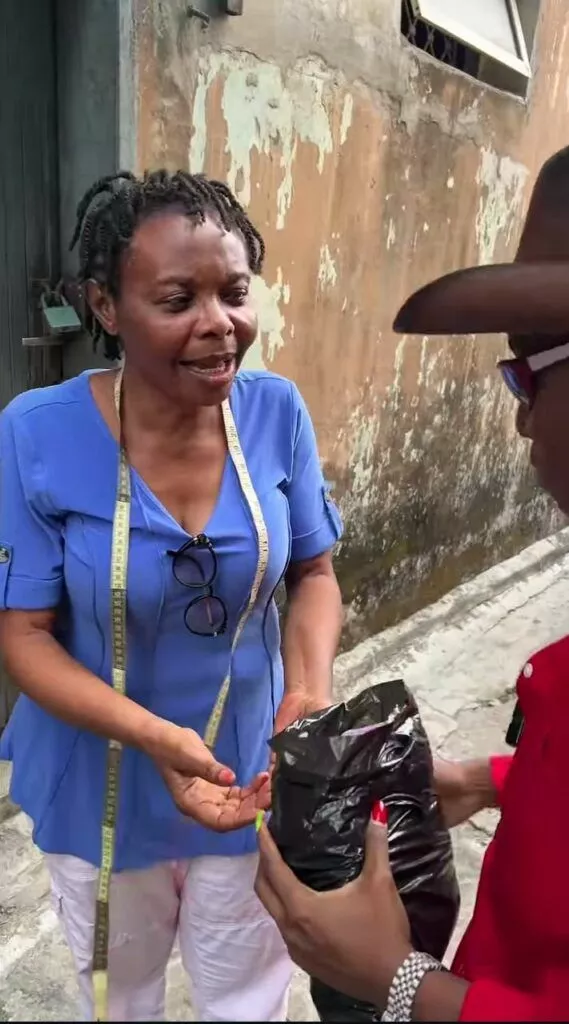 Teni Makanaki gifts mother money, food items for freestyling her song