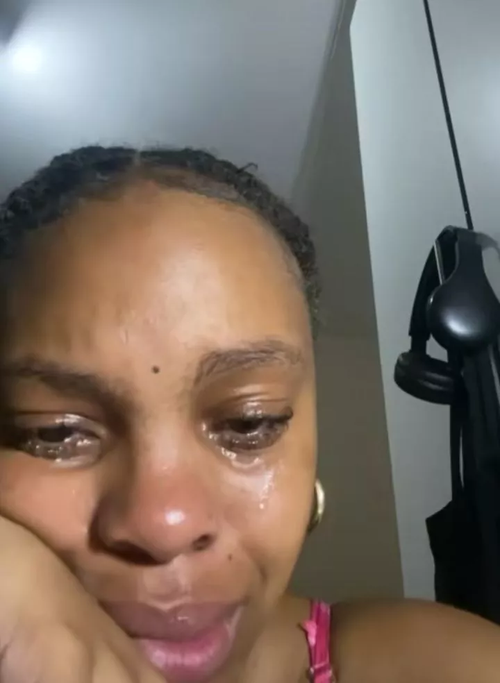 Lady bursts into tears after going through her man's phone