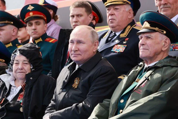 Putin vows his nukes are 'always' ready & snubs UK in WW2 rant at snow-blasted Victory Day parade with ONE TANK