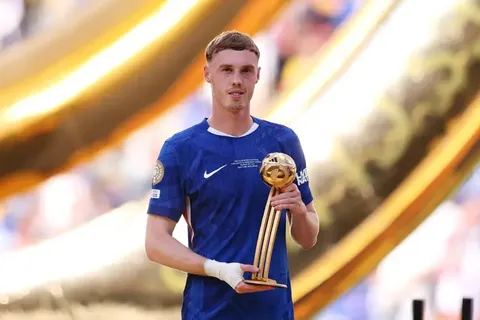 Cole Palmer with the golden ball.