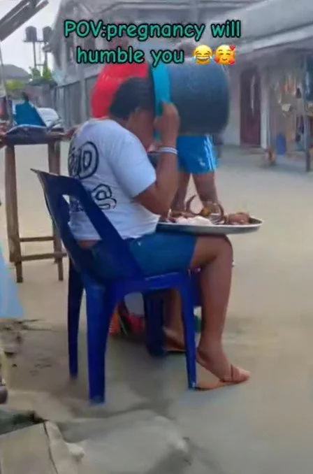 'Pregnancy will humble you' - Moment a pregnant woman drinks 'garri' using a food cooler (Watch)