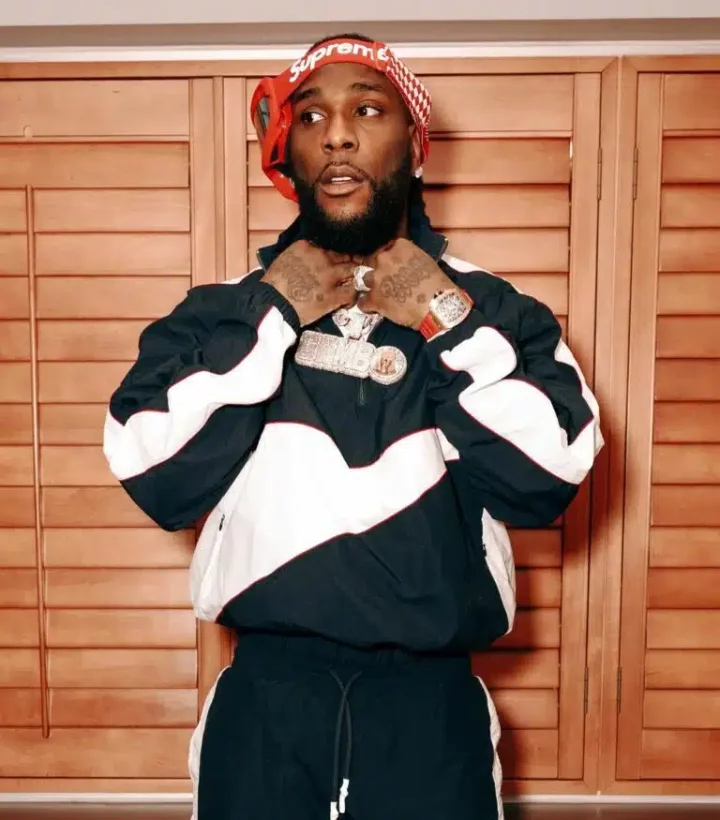 Burna Boy shades Davido after an alleged 30BG fan accused him of being 'impotent'