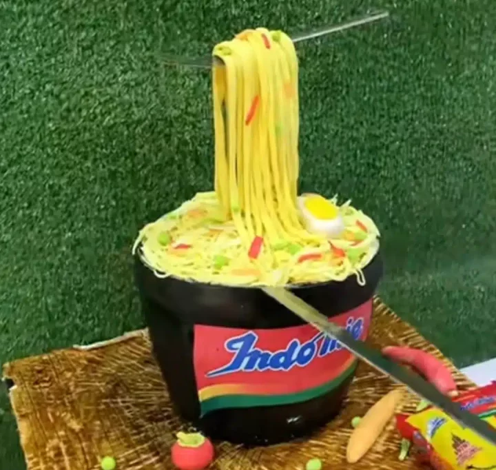 'A master piece'- Talented Nigerian baker wows many with a perfectly baked Indomie Cake