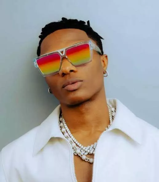 Wizkid's super fan prays for him and FC in Mecca, calls out his full name