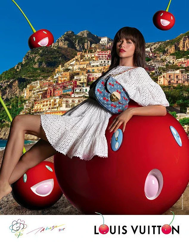 In another snap she styled a stunning white doily cut out dress and blue Vuitton bag with cherry print
