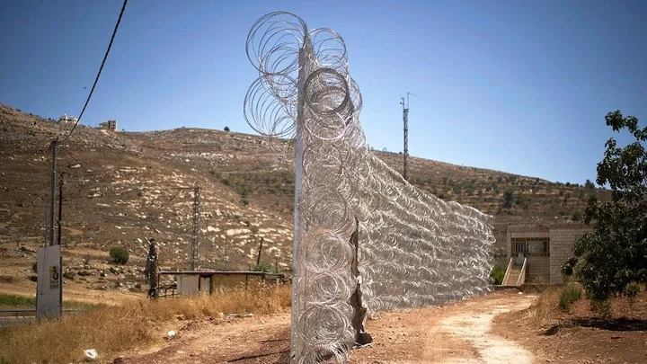 American killed by Israeli settlers in the West Bank, family says American killed by Israeli settlers in the West Bank, family says