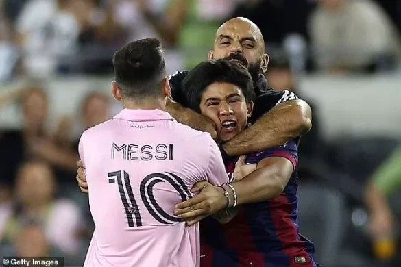Watch how Messi's bodyguard grabs fan's neck as he rips him away from him