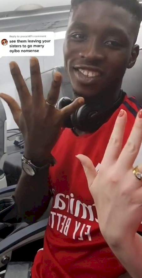 Young Nigerian man flaunts his wedding ring while flying out with white wife (Video)