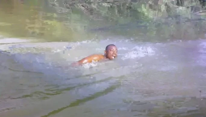 Primary school teacher who swims to school goes viral (Video)