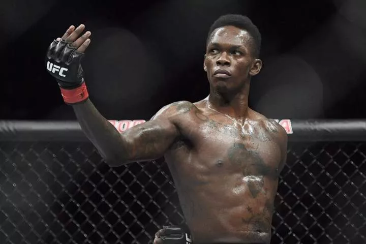 Israel Adesanya receives special welcome in New Zealand after declaring Nigeria 'very corrupt' (Video)