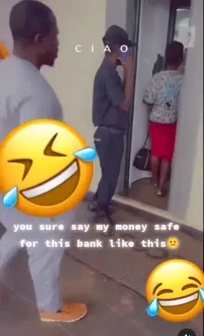 'Sure say my money safe like this?' - Customer expresses worry as bank security guard is spotted using iPhone 14 Pro Max (Video)