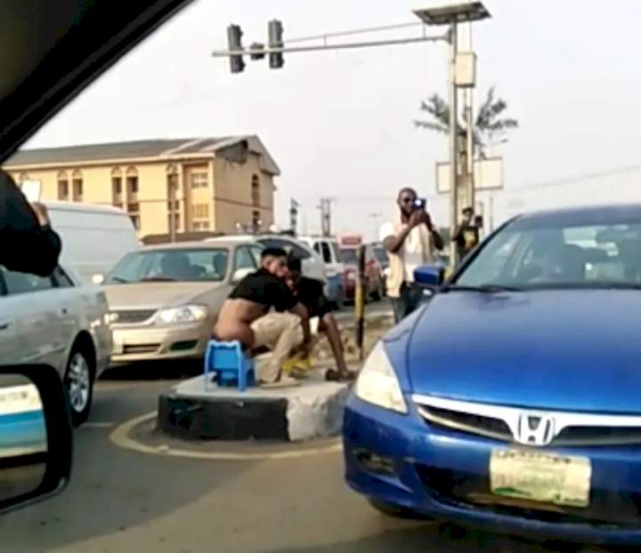 A skit? Suspected yahoo boys filmed defecating and 'eating' their excretra at IMSU junction in Owerri, Imo state (video)